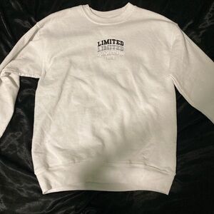 white limited sweater